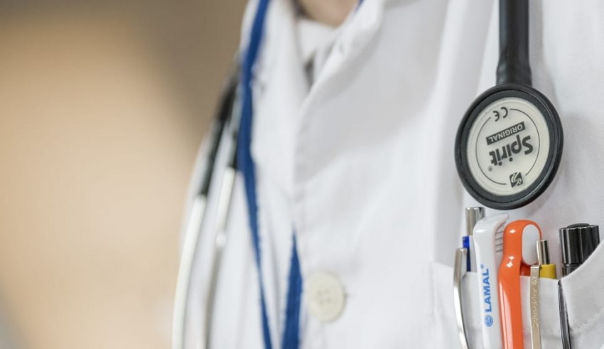 A doctor's coat with a stethoscope on it.