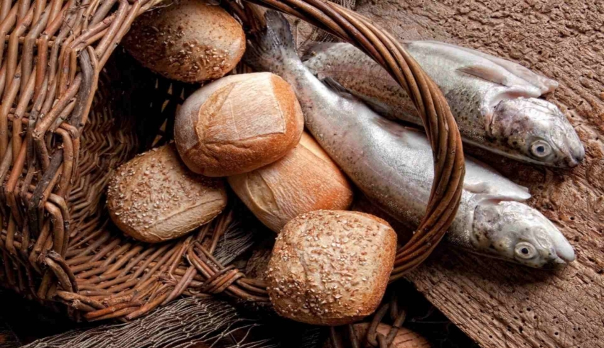 Fish and bread in a basket.