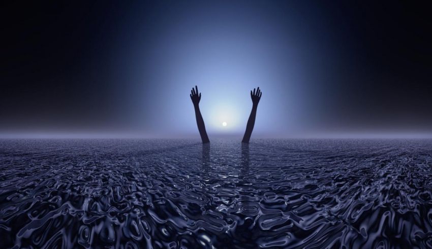 An image of two hands reaching out into the water.