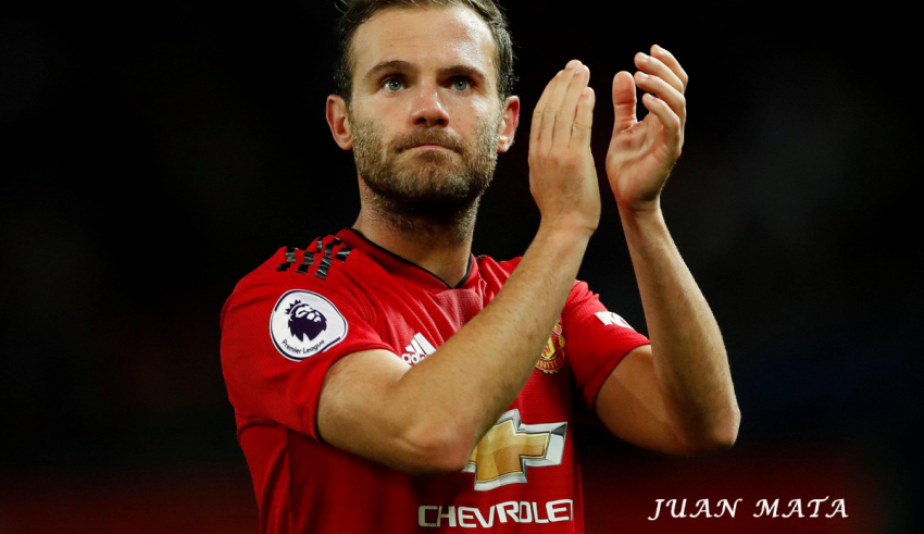 Manchester united player juan manuel mata applauding.