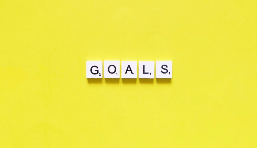 The word goals spelled out on a yellow background.