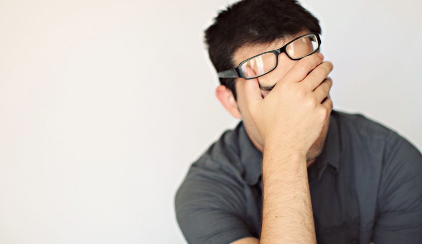 A man with glasses covering his face.