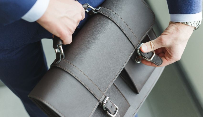 A man in a suit holding a briefcase.