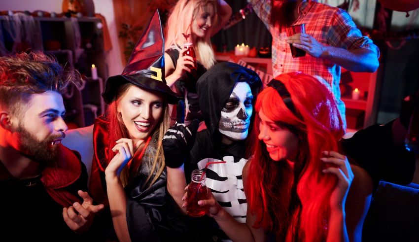 A group of people dressed up in halloween costumes.
