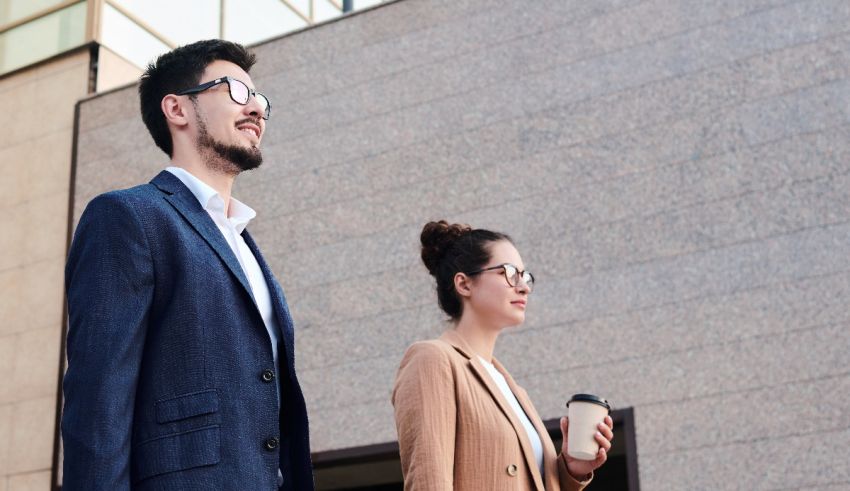 Two business people walking in the city.