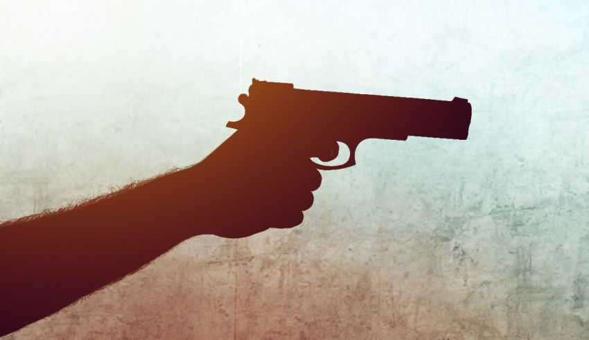 A silhouette of a hand holding a gun.