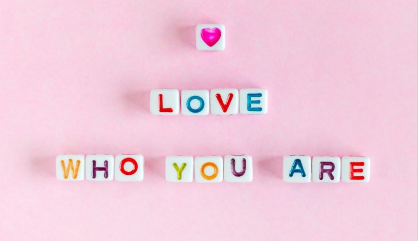 I love who you are written on a pink background.