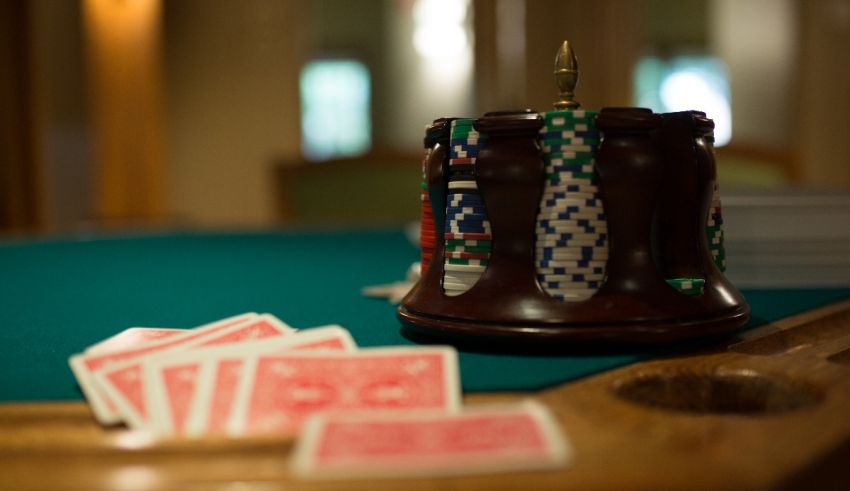 A poker table with cards on it.