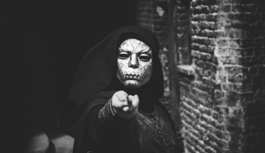A black and white photo of a woman with a skeleton face.
