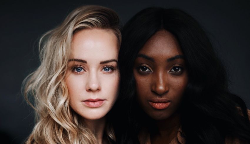 Two black women posing for a photo.