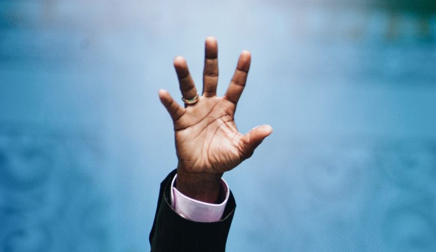 President obama's hand waving in the air.