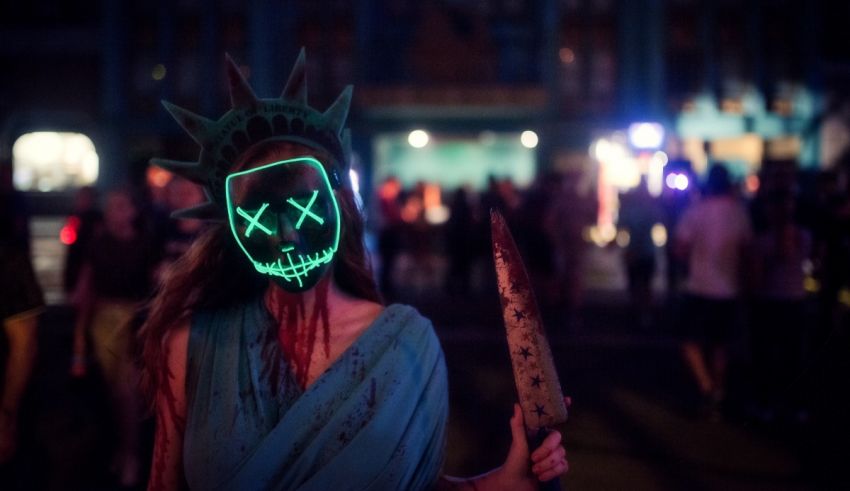 A woman holding a knife in front of a statue of liberty.