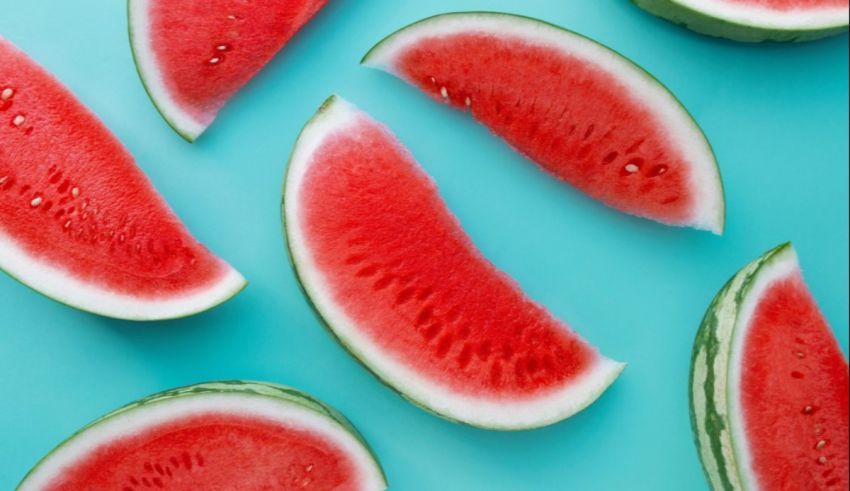 Watermelon slices on a blue background.