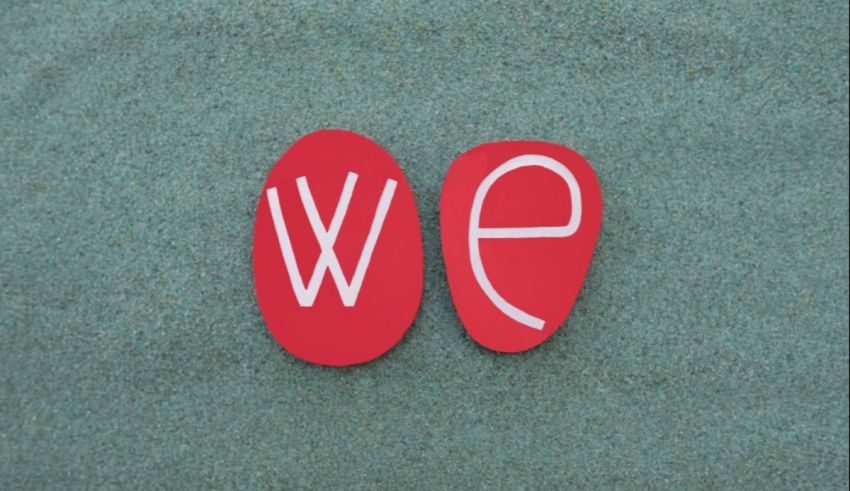 A red and white sign with the word we on it.