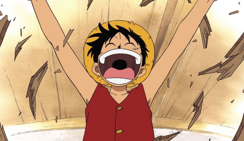 A boy with his arms up in the air in one piece.