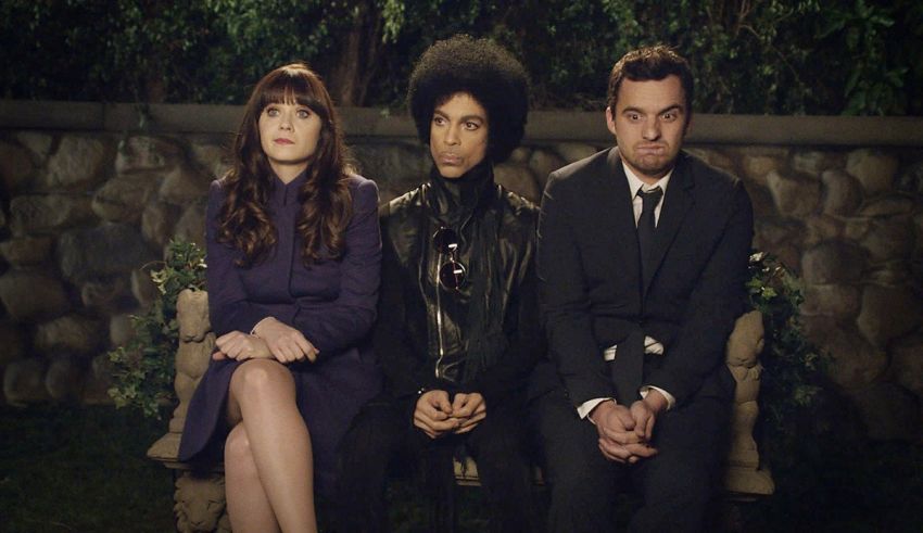 A group of people sitting on a bench.