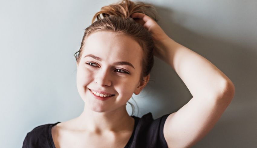 A young woman is posing for a photo.