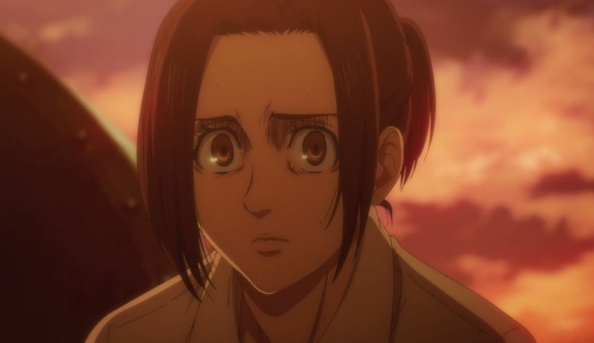 A girl with brown hair is staring at the sky.