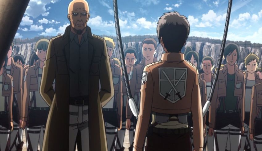 A group of people standing in front of a group of people.