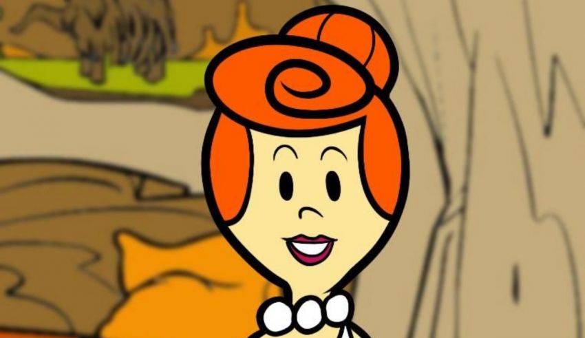A cartoon woman with orange hair is standing in a wooded area.