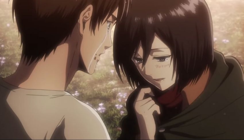A man and a woman looking at each other in a field.