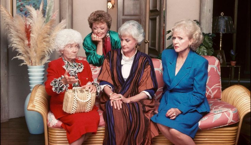 A group of women sitting on a couch.