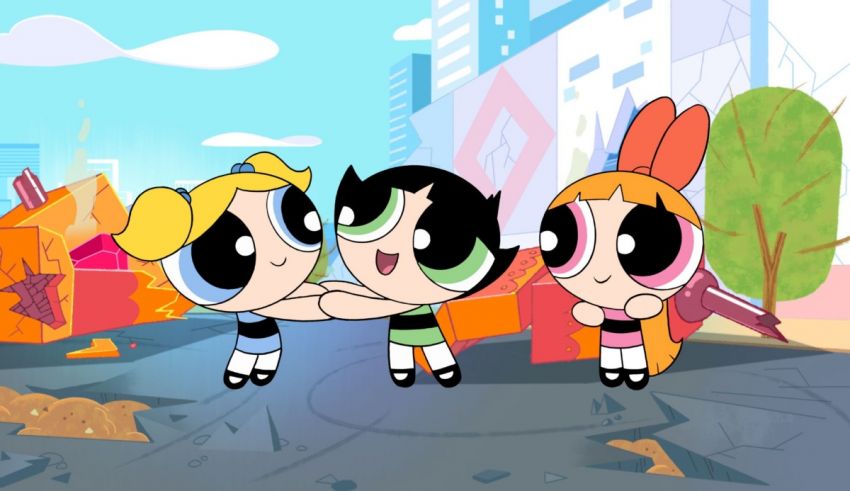 The powerpuff girls are standing in a city.