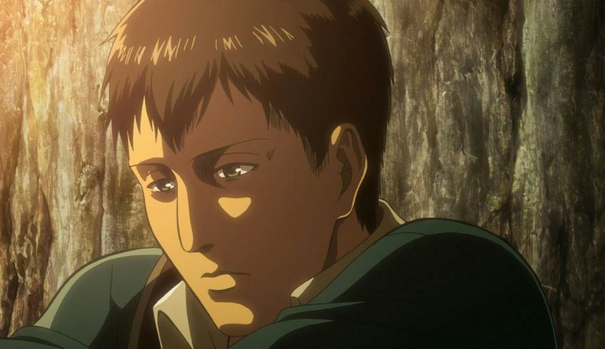 A man in an anime sitting in a wooded area.