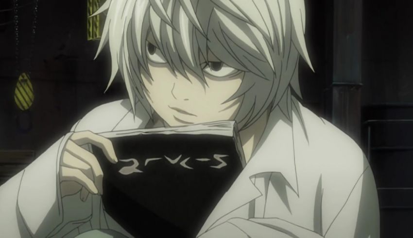 An anime character with white hair holding a book.