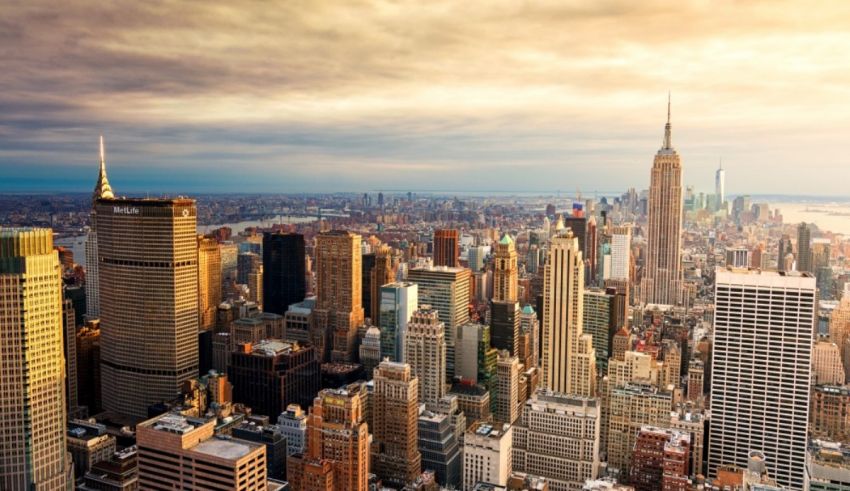 New york city skyline at sunset stock photo.