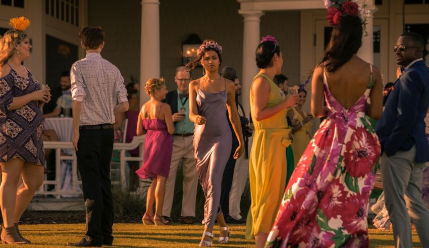A group of people in colorful dresses at a party.