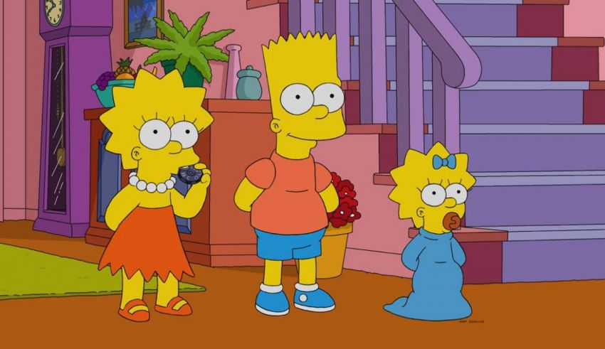 The simpsons family standing in front of stairs.