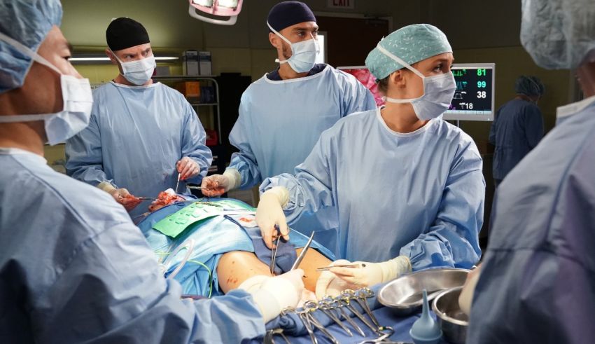 A group of surgeons operating on a patient.