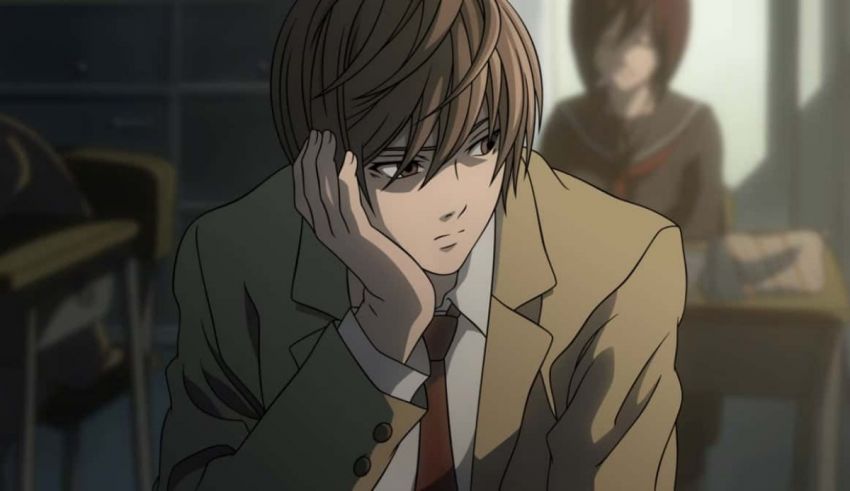 A man in a suit and tie is sitting in an office.