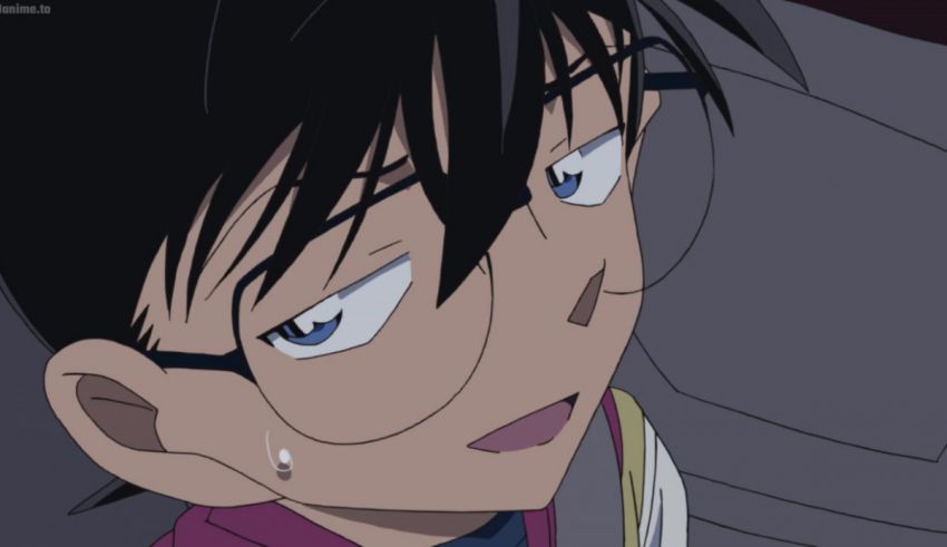 An anime character with glasses and blue eyes.