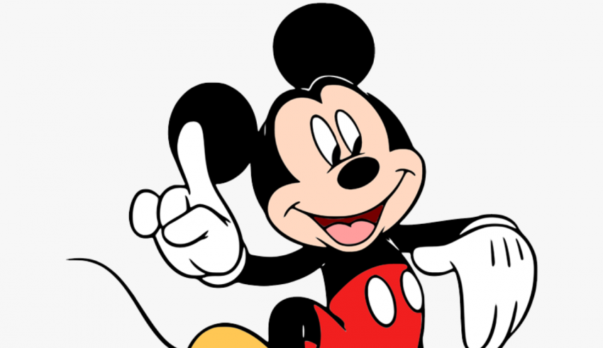 A mickey mouse pointing his finger in the air.