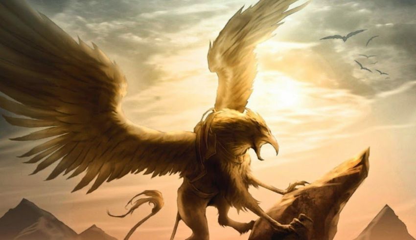 A golden eagle is standing on top of a rock.