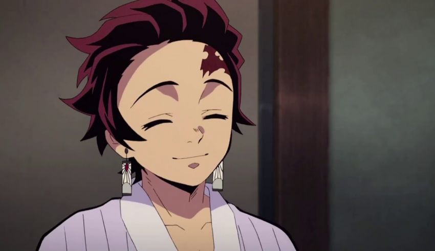 An anime character in a white robe with red hair.