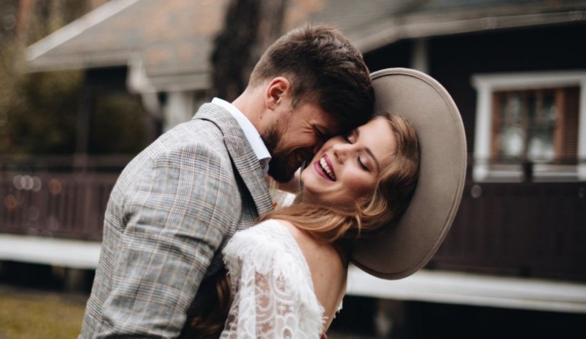 A man and woman hugging.