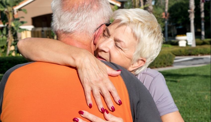 A woman hugging a man.