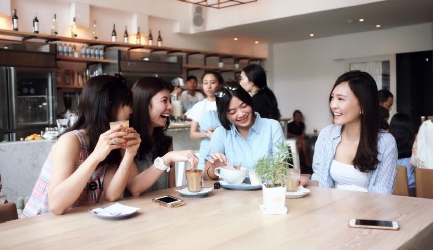 A group of women sitting at a table.