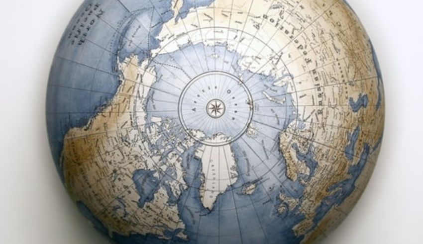 A globe with a map of the arctic on it.