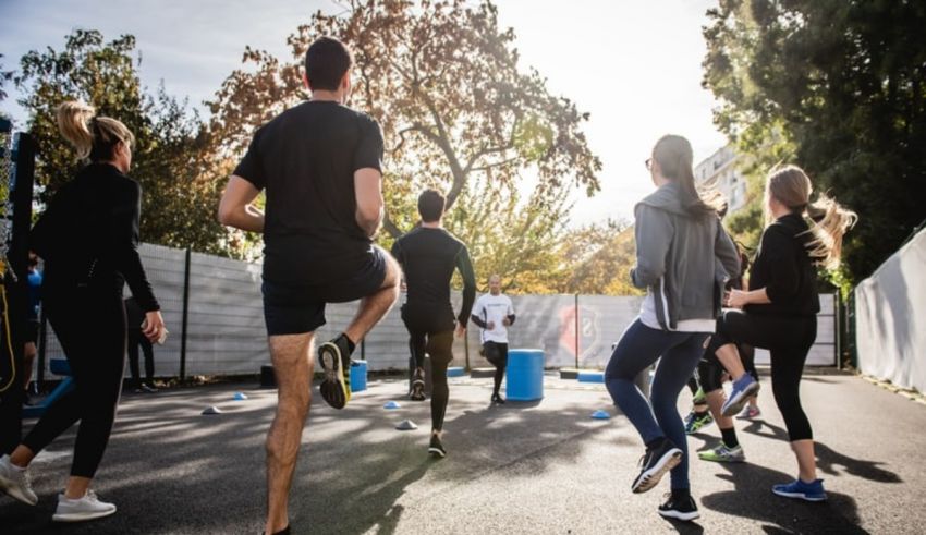 A group of people running on a street.