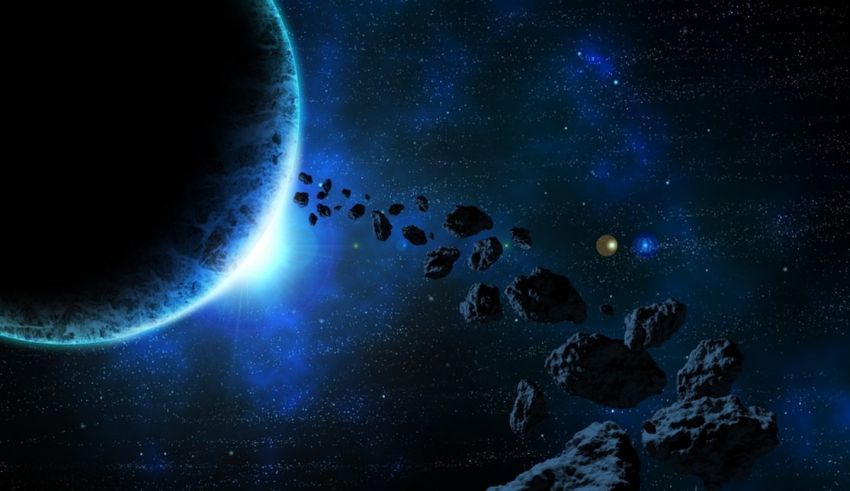 An image of an asteroid and a planet in space.