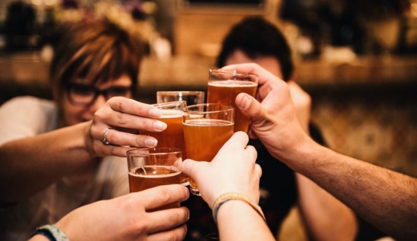 A group of people clinking glasses.