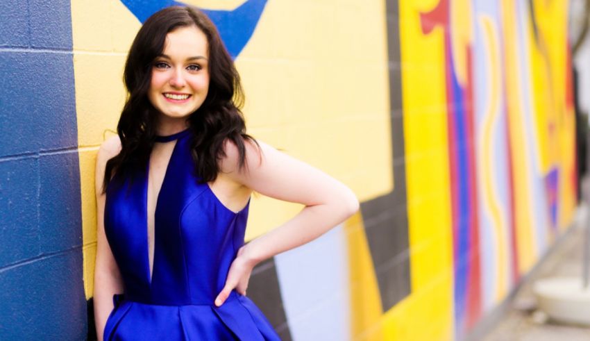 A woman in a blue dress.