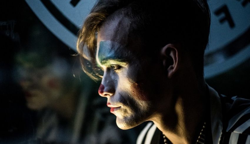 A man with makeup on his face.
