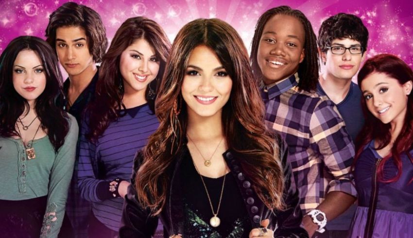 Selena gomez and her friends are posing in front of a purple background.