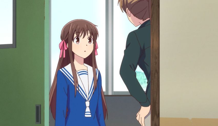 A girl is standing next to a boy in an anime.