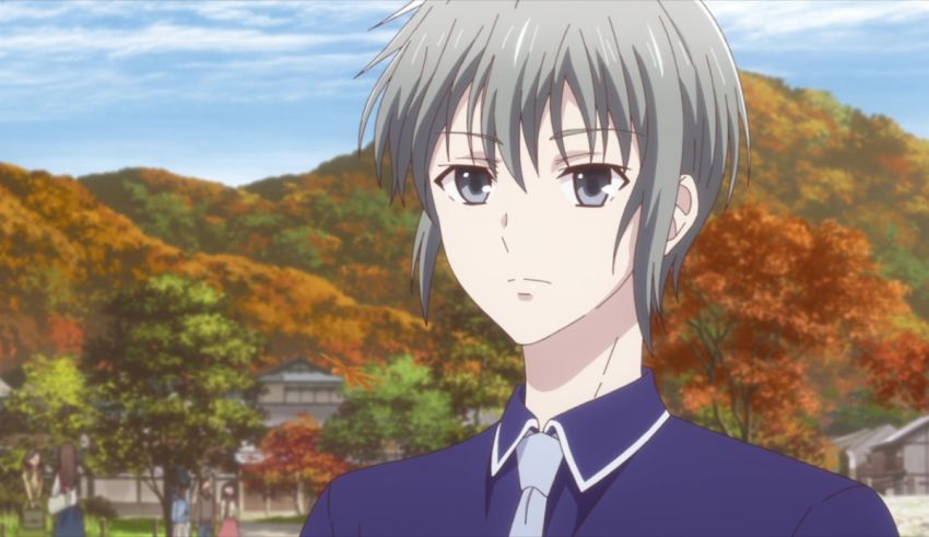 An anime character in a blue shirt and tie.